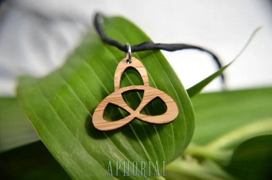 Celtic Trinity Knot Pendant In Cherry On Leather Cord